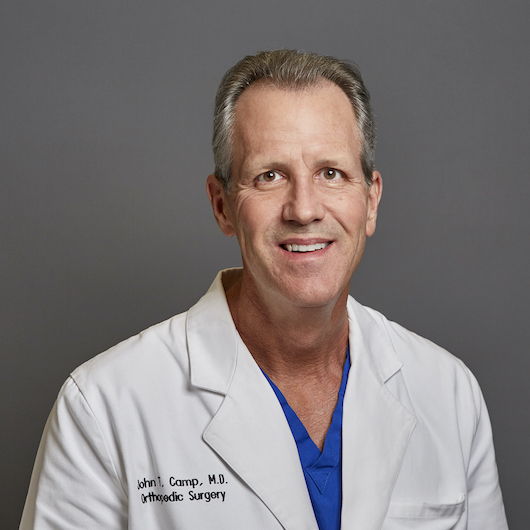 John Camp, M.D.