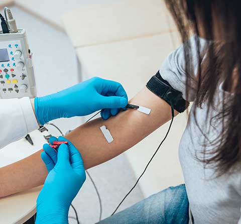 Orthopedic doctor performing nerve evaluations on a patient at Azalea Orthopedics in Palestine, Texas.